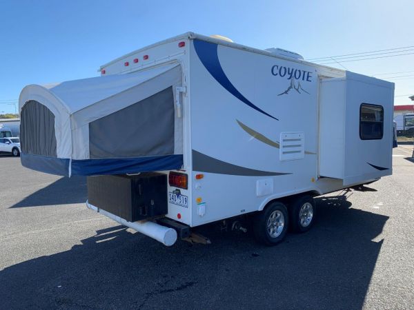 2009 Coyote slide out expander caravan image