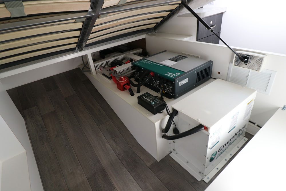 The bed raises easily for easy access to storage space and electronics