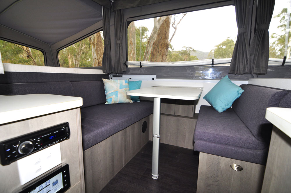 The convertible lounge nicely doubles as an extra bed with the electronics in front alongside the seating area