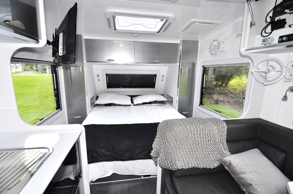 Full-height cupboards provide plenty of storage for your journey