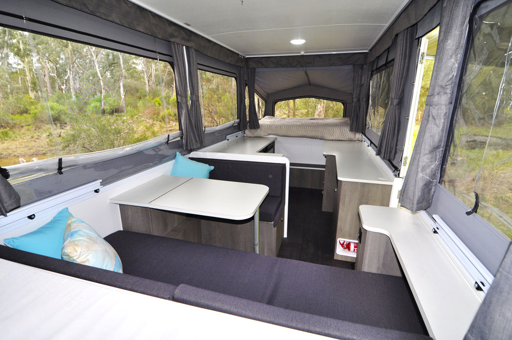 The interior area comfortably seats five adults with a long list of interior features and upholstered return seat backing